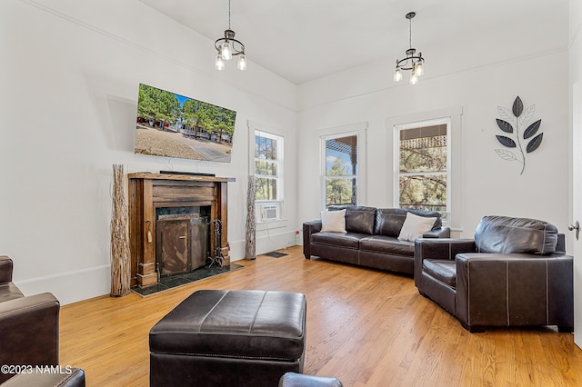 3380 E Lockett Rd, Flagstaff, AZ 86004 - living room with a fireplace with flush hearth and wood finished floors