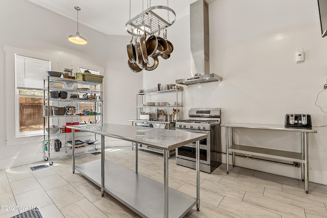 3380 E Lockett Rd, Flagstaff, AZ 86004 - kitchen featuring double oven range, wall chimney range hood, and a chandelier
