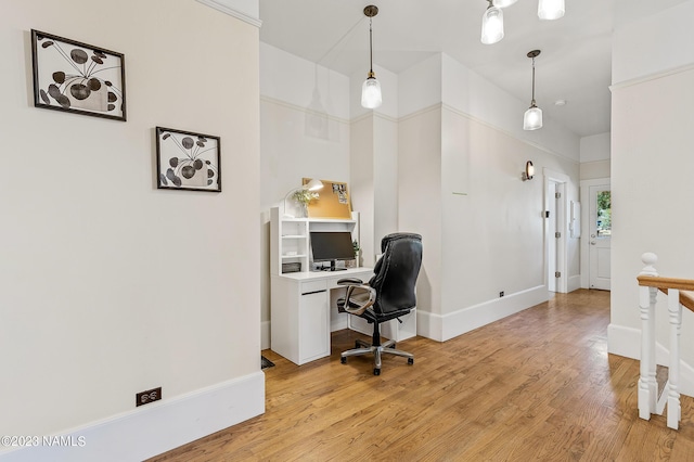3380 E Lockett Rd, Flagstaff, AZ 86004 - home office featuring light wood finished floors and baseboards