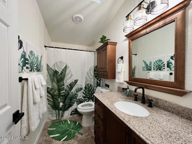 bathroom featuring vaulted ceiling, vanity, toilet, and a shower with curtain