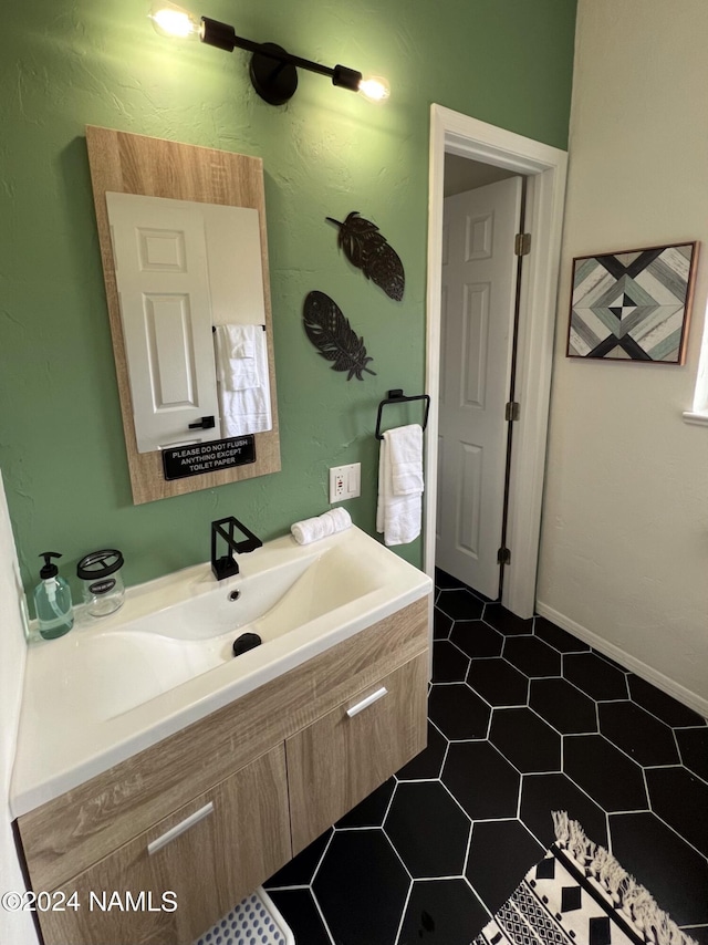 bathroom featuring vanity and tile patterned floors