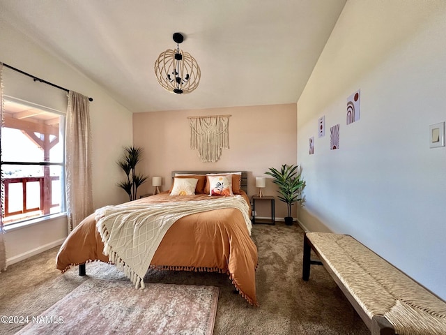 carpeted bedroom with baseboards