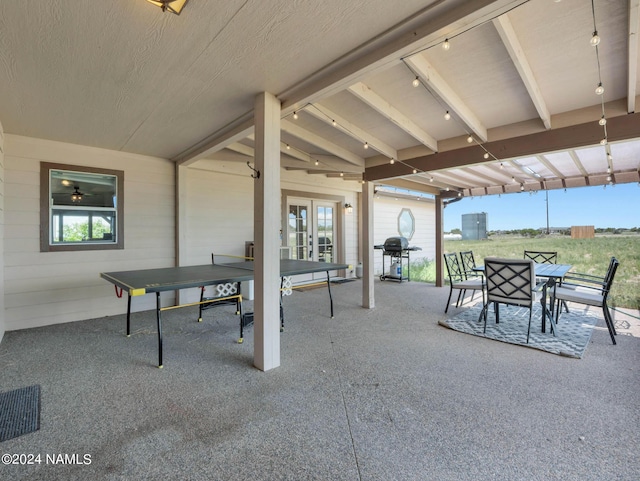 view of patio with visible vents, grilling area, french doors, and outdoor dining space