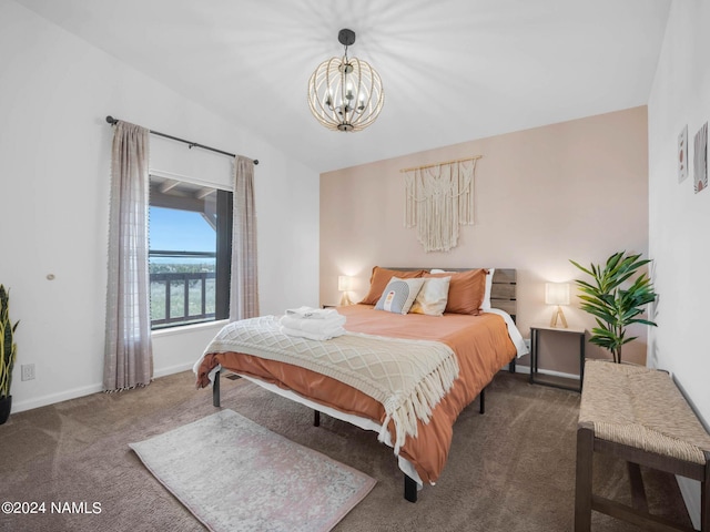 bedroom featuring carpet floors, vaulted ceiling, baseboards, and an inviting chandelier