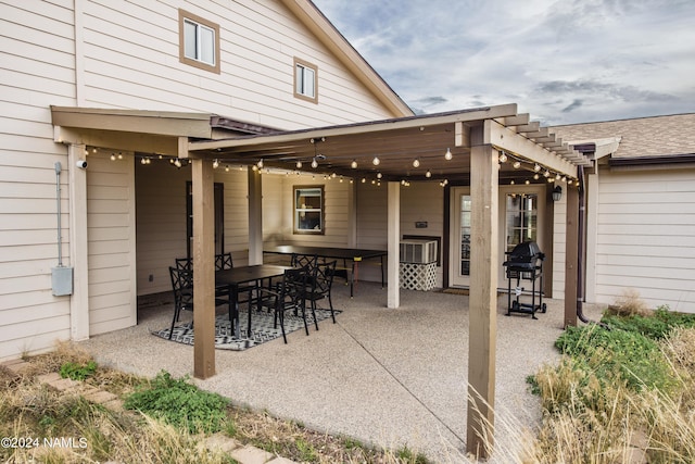 view of patio / terrace with outdoor dining area and grilling area