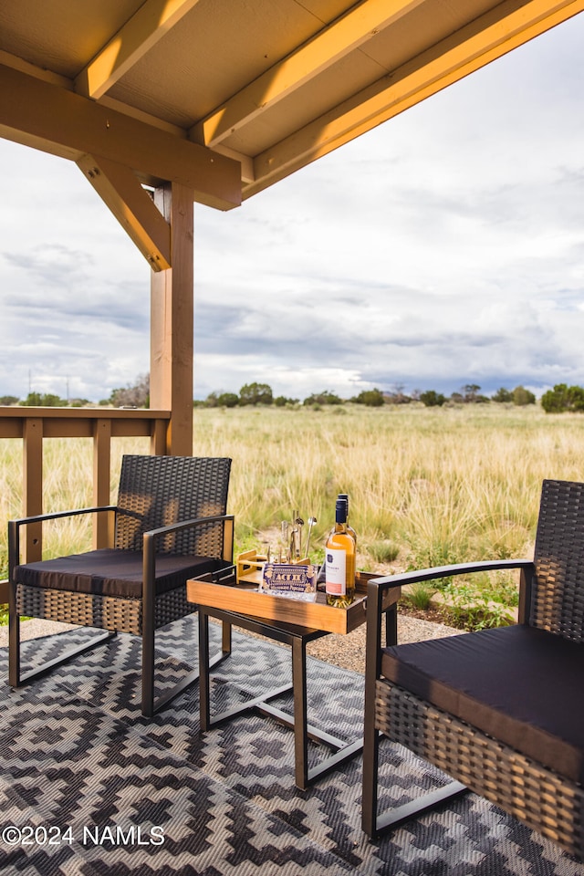 exterior space featuring a deck and a rural view