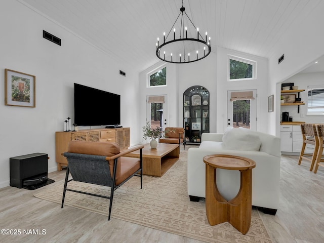 389 N Laramy Ln, Parks, AZ 86018 - living room with light wood finished floors, high vaulted ceiling, healthy amount of natural light, and wooden ceiling