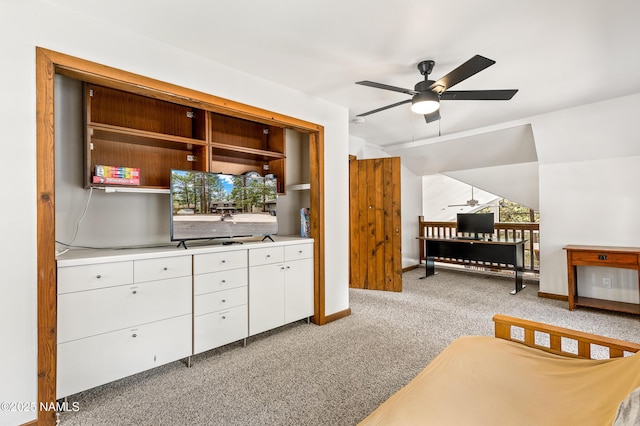 bedroom featuring baseboards and light carpet