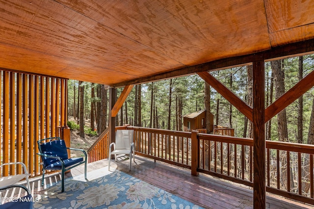 sunroom with a forest view