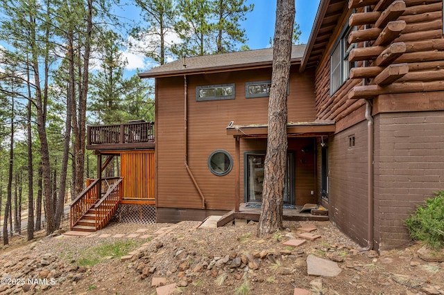 exterior space featuring a wooden deck