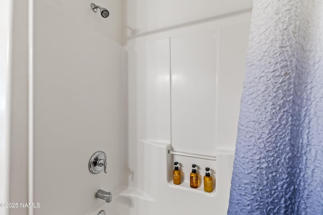 full bath with shower / bath combination with curtain