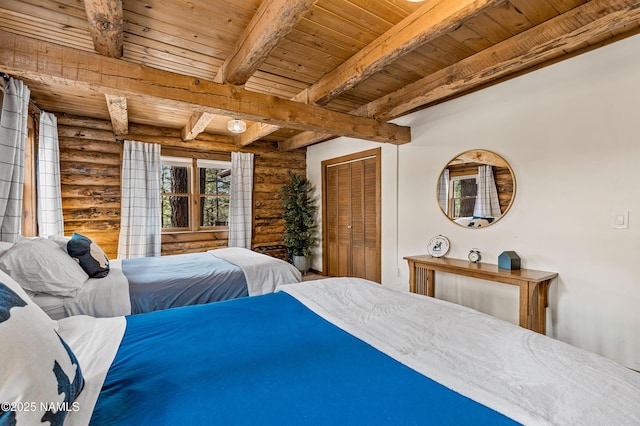 bedroom with beamed ceiling, wood ceiling, and rustic walls