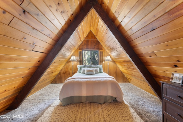 carpeted bedroom featuring vaulted ceiling, wood walls, and wooden ceiling
