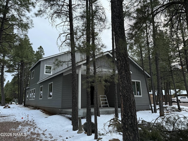 view of front of property featuring covered porch and board and batten siding