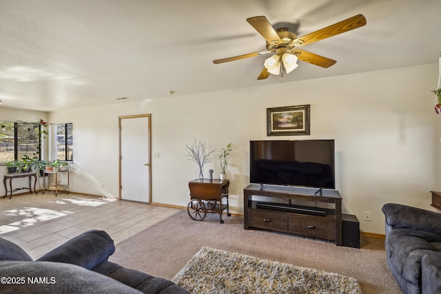 11280 N Zady Ln, Flagstaff, AZ 86004 - tiled living area with carpet flooring, baseboards, and ceiling fan
