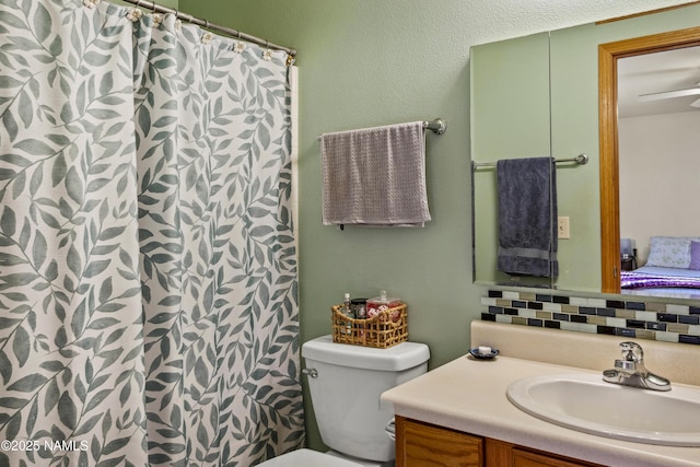 11280 N Zady Ln, Flagstaff, AZ 86004 - bathroom with toilet, vanity, and a shower with shower curtain