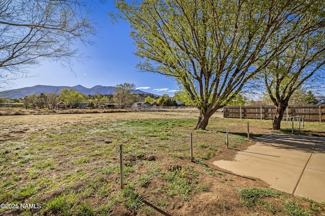 11280 N Zady Ln, Flagstaff, AZ 86004 - view of yard with fence, a patio area, and a mountain view