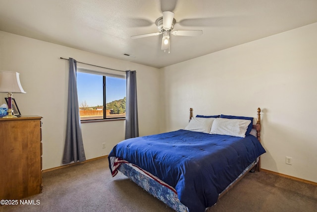 11280 N Zady Ln, Flagstaff, AZ 86004 - carpeted bedroom featuring ceiling fan, baseboards, and visible vents