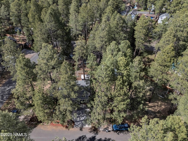 867 Onieda, Flagstaff, AZ 86005 - aerial view of property and surrounding area featuring a heavily wooded area