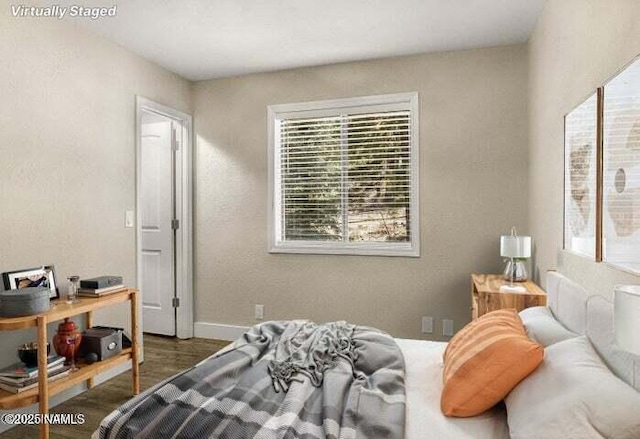 4573 Canyon Loop, Flagstaff, AZ 86005 - bedroom featuring wood finished floors and baseboards
