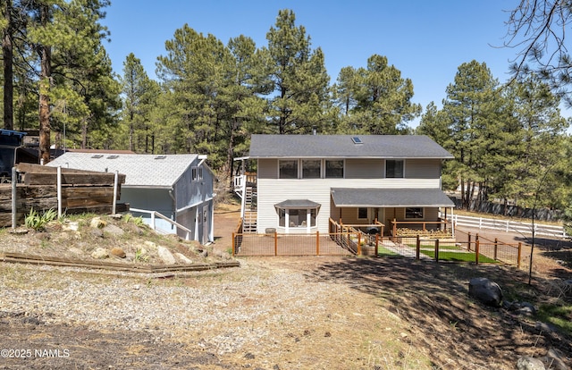 4573 Canyon Loop, Flagstaff, AZ 86005 - rear view of property with stairway, a deck, and fence