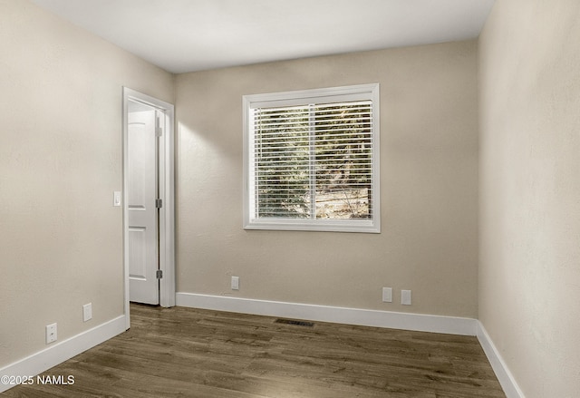 4573 Canyon Loop, Flagstaff, AZ 86005 - empty room with wood finished floors and baseboards