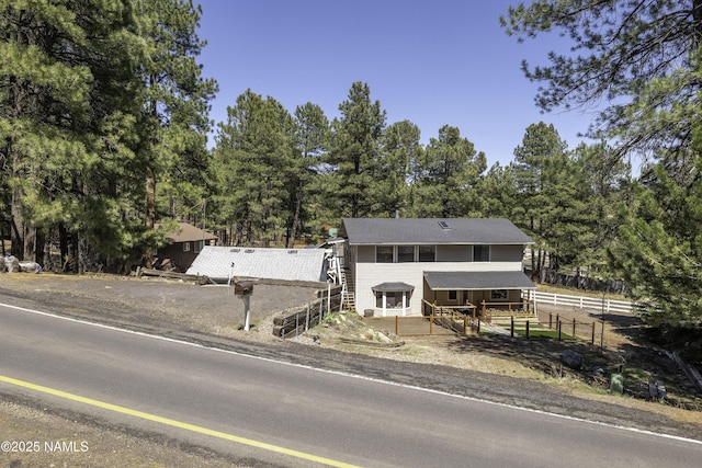 4573 Canyon Loop, Flagstaff, AZ 86005 - view of front facade with view of scattered trees