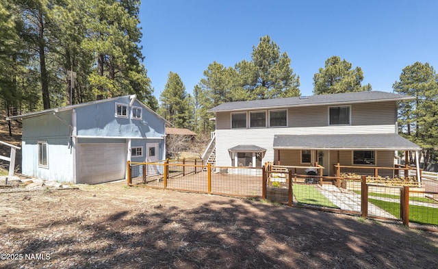4573 Canyon Loop, Flagstaff, AZ 86005 - view of front of property with an outbuilding and a garage