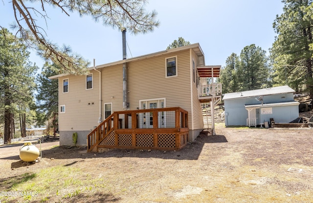 4573 Canyon Loop, Flagstaff, AZ 86005 - rear view of house featuring a wooden deck