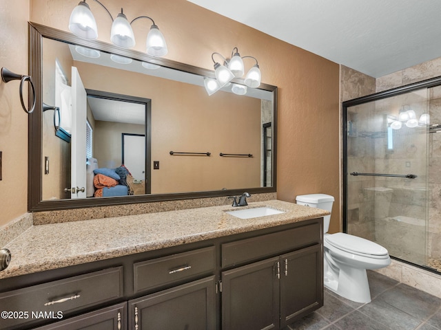 3114 N Connor St, Flagstaff, AZ 86004 - full bath with a shower stall, ensuite bath, vanity, a textured wall, and tile patterned flooring