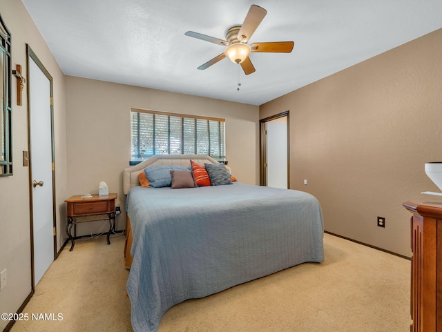 3114 N Connor St, Flagstaff, AZ 86004 - bedroom with light colored carpet and ceiling fan