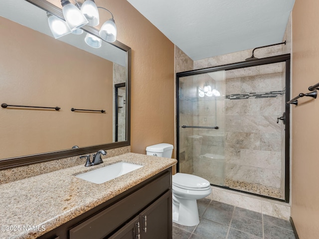 3114 N Connor St, Flagstaff, AZ 86004 - bathroom featuring a shower stall, vanity, a textured wall, and a chandelier
