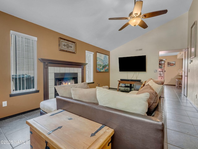 3114 N Connor St, Flagstaff, AZ 86004 - living area with tile patterned floors, lofted ceiling, ceiling fan, and a tiled fireplace