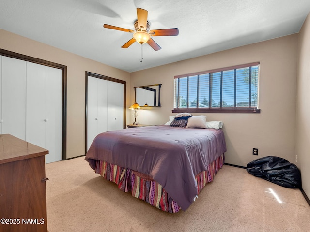 3114 N Connor St, Flagstaff, AZ 86004 - bedroom featuring multiple closets, carpet floors, and a ceiling fan
