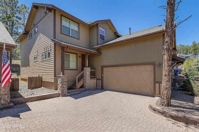 view of front of property featuring a garage