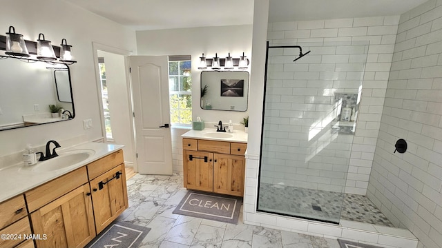 bathroom featuring vanity and an enclosed shower