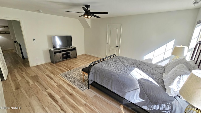 bedroom featuring ceiling fan and light hardwood / wood-style flooring