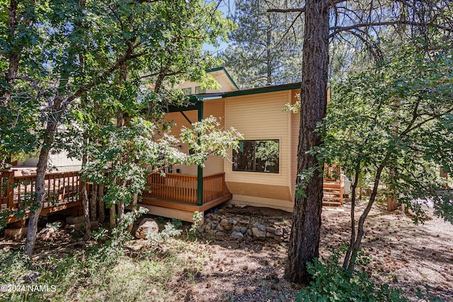 335 Sandia Cir, Munds Park, AZ 86017 - view of home's exterior with a wooden deck