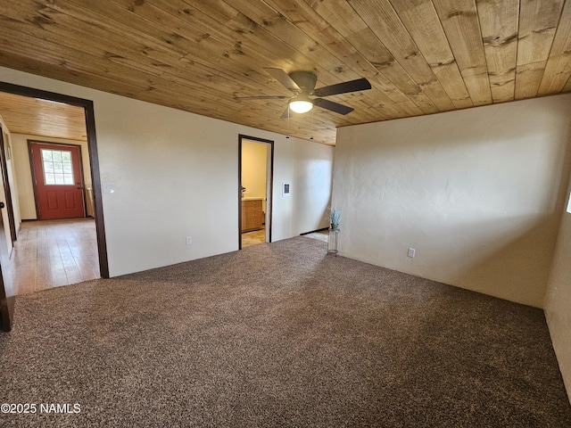 588 W Mesa Dr, Williams, AZ 86046 - carpeted empty room with wood ceiling and a ceiling fan