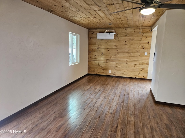 588 W Mesa Dr, Williams, AZ 86046 - empty room with ceiling fan, hardwood / wood-style flooring, wood ceiling, a wall unit AC, and baseboards