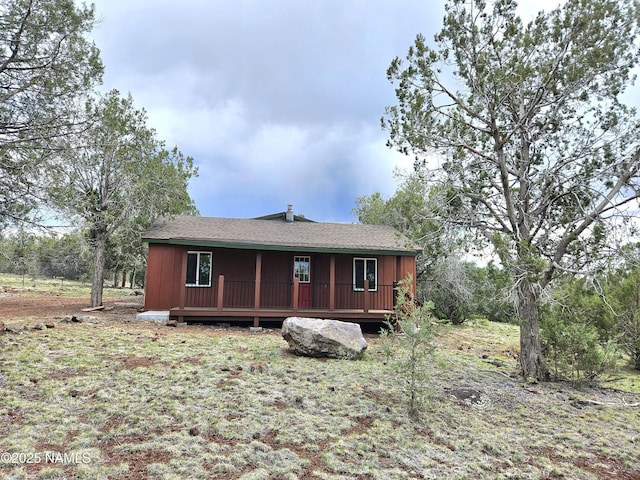 588 W Mesa Dr, Williams, AZ 86046 - view of front of house with a wooden deck