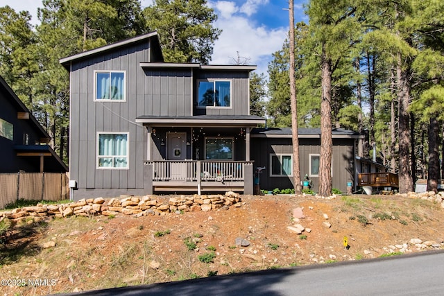 view of front of property featuring covered porch and board and batten siding