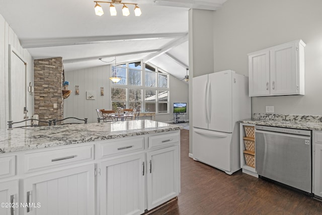 kitchen featuring dark wood-style flooring, white cabinetry, freestanding refrigerator, dishwasher, and vaulted ceiling with beams