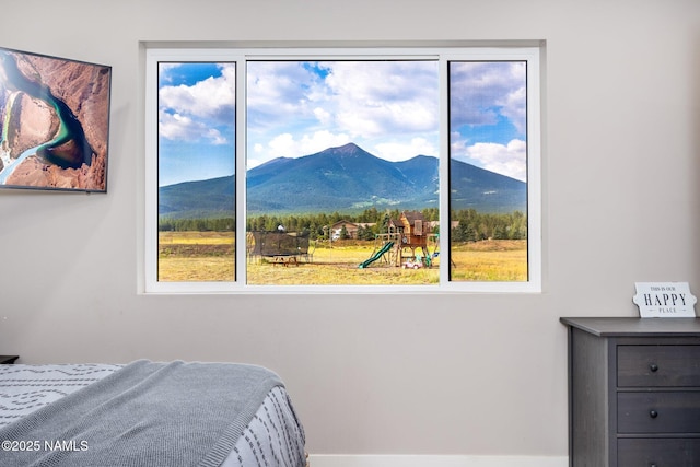 6552 Kelsey Springs Way, Flagstaff, AZ 86001 - bedroom featuring a mountain view and multiple windows