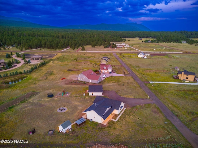 6552 Kelsey Springs Way, Flagstaff, AZ 86001 - aerial view of property's location featuring a mountain backdrop and a forest