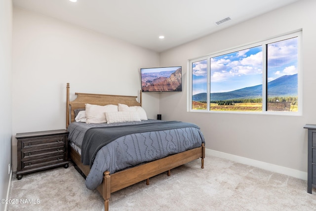 6552 Kelsey Springs Way, Flagstaff, AZ 86001 - bedroom featuring light carpet, multiple windows, recessed lighting, and baseboards
