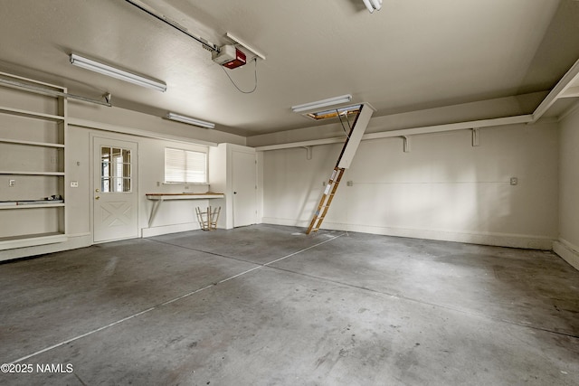 489 N Spitz Spring Rd, Parks, AZ 86018 - garage featuring a garage door opener