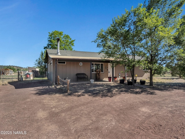7776 Moonbeam Dr, Flagstaff, AZ 86004 - back of house with a gate