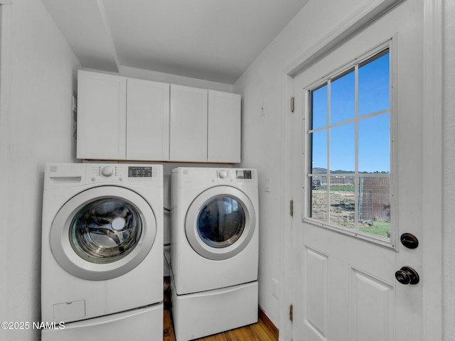 7776 Moonbeam Dr, Flagstaff, AZ 86004 - laundry room with separate washer and dryer, cabinet space, and light wood-style floors