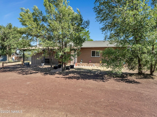 7776 Moonbeam Dr, Flagstaff, AZ 86004 - view of front of property featuring brick siding
